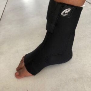 Ankle support with pad